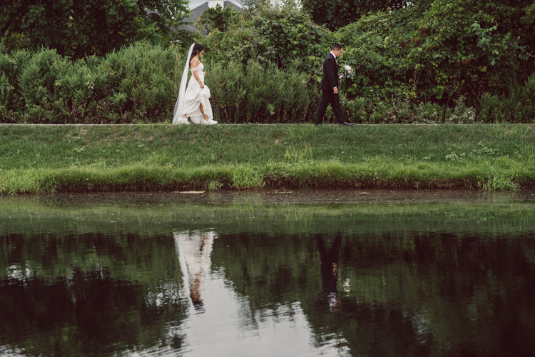 Brianna and Joe perfectly balances each other with their opposite personalities. Brianna quiet and calm and Joe loud and funny, they are the yin and yang to each other and together they create amazing chemistry. Joe's eyes literally sparkles when he is looking at her. Brianna and Joe's summer wedding at Trump National Golf Club Colts Neck NJ this past August was nothing but fun, filled with love and happy tears. Love is all we need in a wedding day! Brianna and Joe got married at ST. Mary’s Church in Colts Neck NJ then partied at Trump National Golf Club Colts Neck NJ. As soon as everyone was inside for the reception, the heavy grey clouds released a down pour washing the humidity away. Leaving cool evening for the newlyweds and their wedding guests to enjoy. Brianna and Joe's wedding at Trump National Golf Club Colts Neck NJ photographed by Karis, NY NJ wedding and elopement photographer Hey Karis.